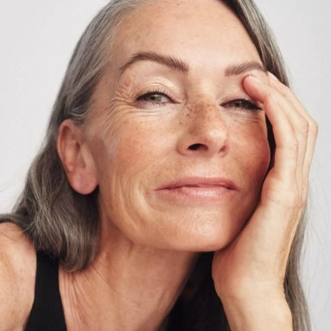 femme 50-60 ans ménopause vieillissement visage.